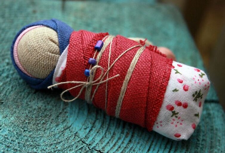 doll bandaged as a health amulet